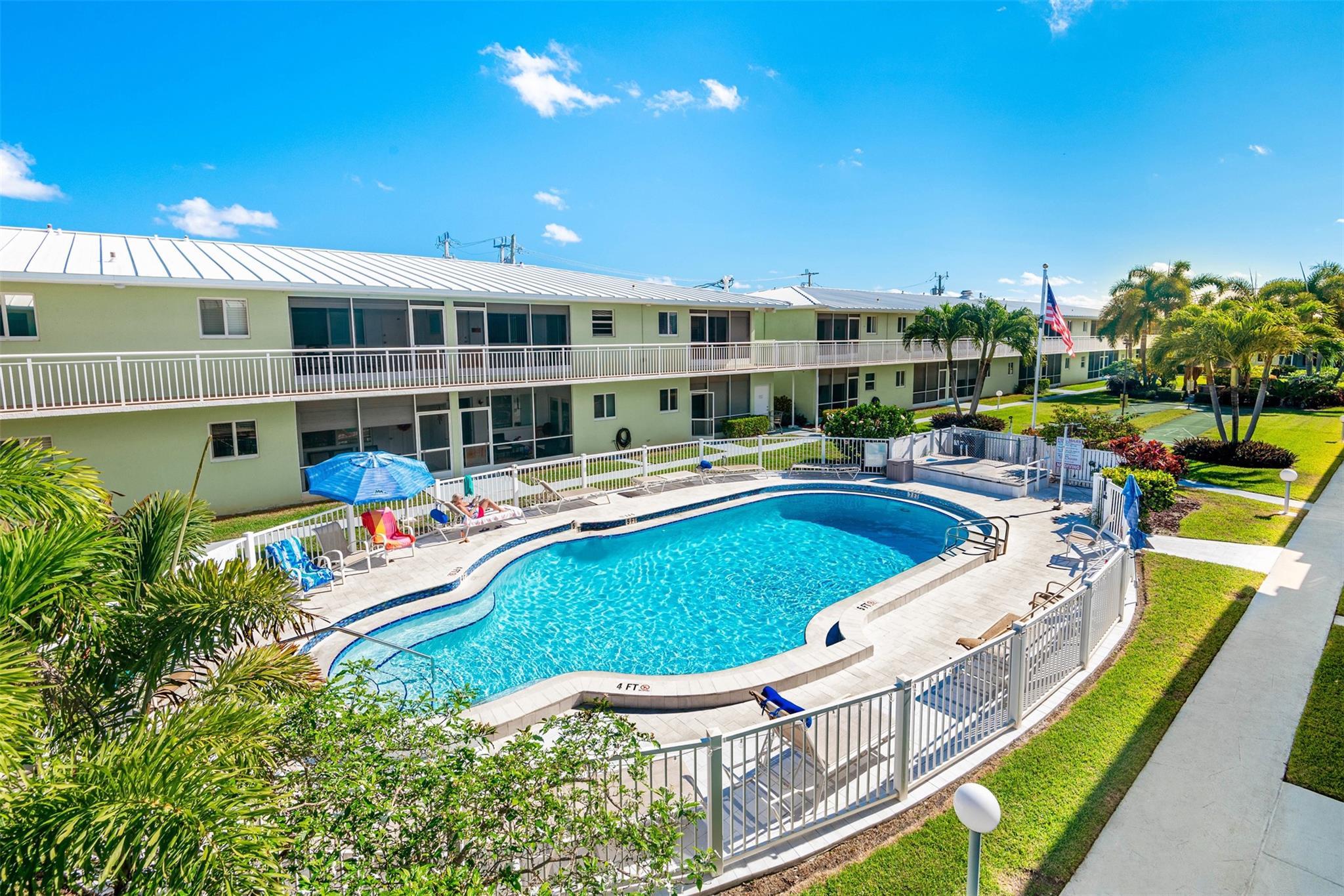 Immaculate, turn key, 2 bedroom 2 full bath, top floor apartment overlooking the pool and courtyard. This stunning, beautifully furnished, apartment features an updated kitchen and both baths, newer appliances, A/C, and water heater, plus all tile floors. Come and enjoy the friendly atmosphere of this active 55+ community located in prestigious Lighthouse Point!