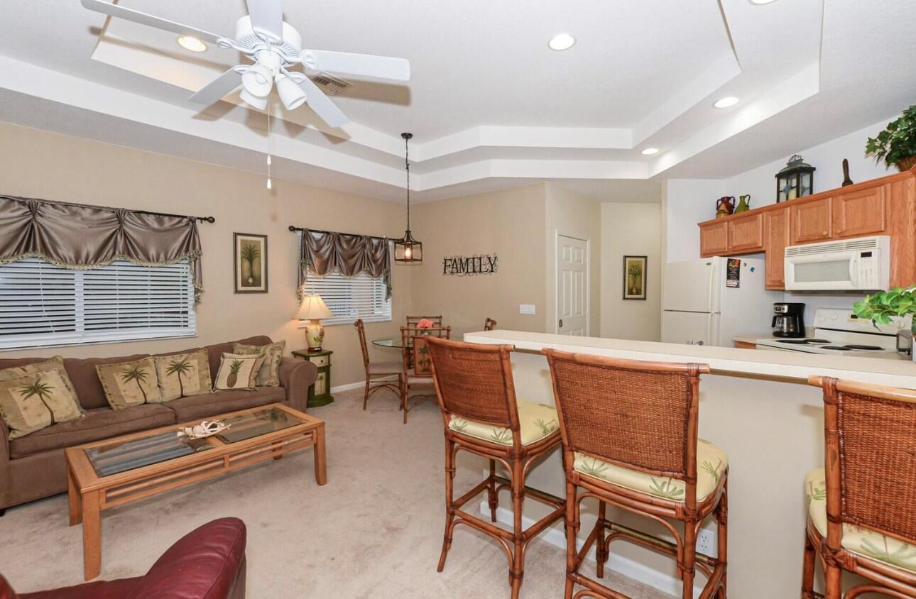 Turnkey investment opportunity in PGA Village's Castle Pines! This fully furnished 2BR/2.5BA lock-out condo offers flexibility to rent as a full 2-bedroom unit or separately as a 1BR and studio for maximum income potential. Features include a spacious layout, well-equipped kitchen, and screened patio. Located in a gated community with resort-style amenities including pool, hot tub, and golf access. Perfect for investors or seasonal living--ready to generate rental revenue from day one!