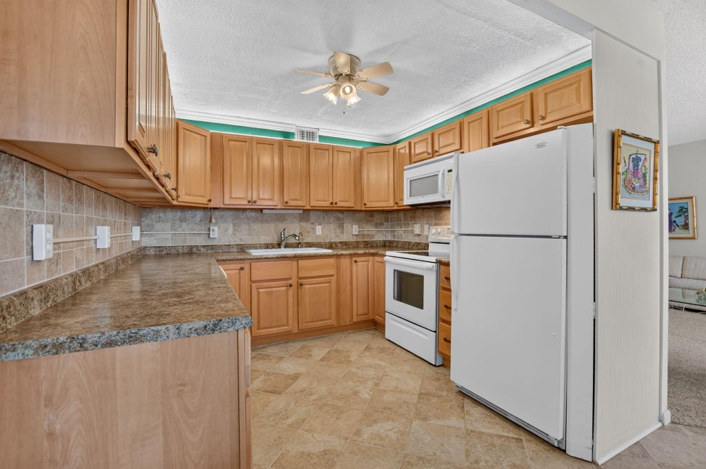 Photo of 2049 Ventnor O Crescent #2049, Deerfield Beach, FL 33442 (MLS # B26048186)