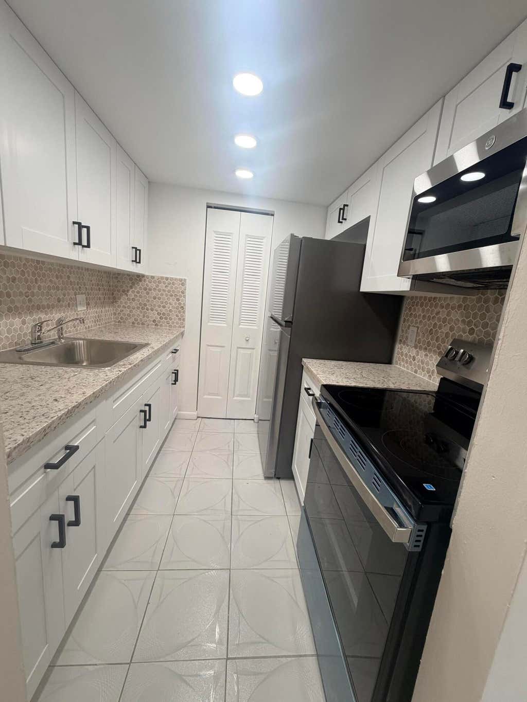 Photo of 1210 Old Boynton Road #103, Boynton Beach, FL 33426 (MLS # B26068774)