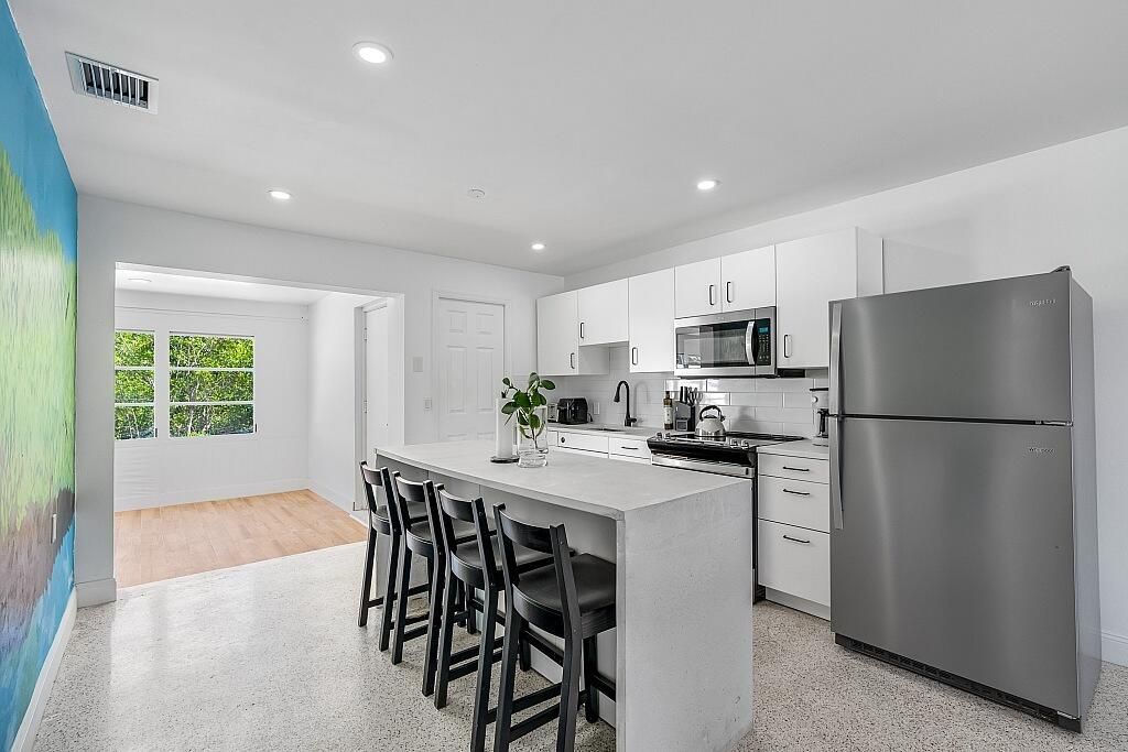 Photo of 30 SW Hideaway Place, Stuart, FL 34994 (MLS # R10993345)