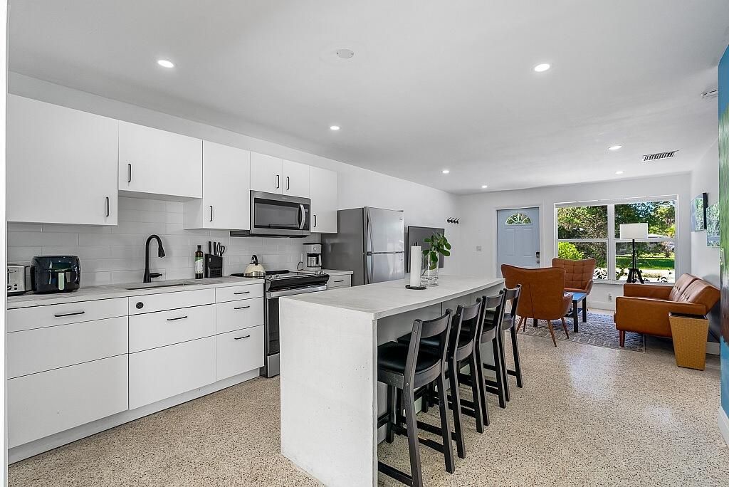 Photo of 30 SW Hideaway Place, Stuart, FL 34994 (MLS # R10993345)