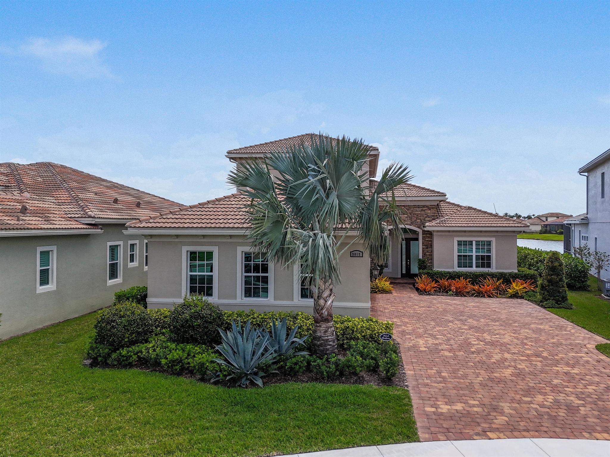 Better than new! Available to rent now, this 4 BR 4.5 BA with den, bonus room and 3 CG. This newly constructed CBS Home in the spectacular Verano PGA community is truly a masterpiece.Offering a premium lake front location and located on a private cul-de-sac, this Kolter Dulce model is one of a kind. Live the resort lifestyle in this private gated community with perhaps one of the most prestigious HOA clubhouse offerings on the Treasure Coast. This place is like no other !