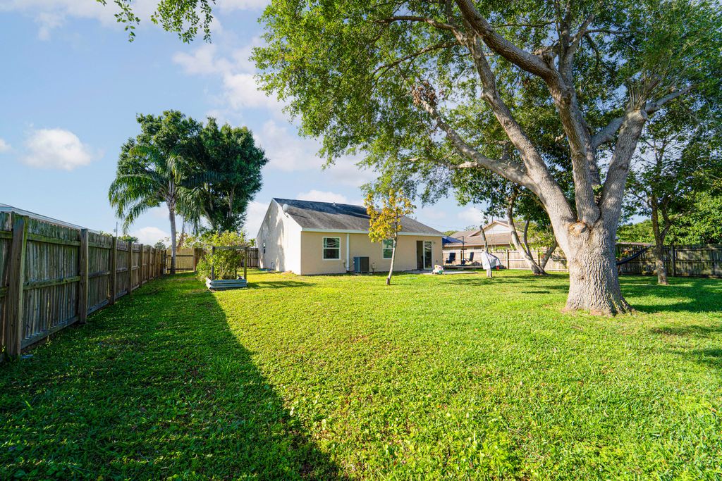 Photo of 2461 SE Alfonso Avenue, Port Saint Lucie, FL 34952 (MLS # R11081934)