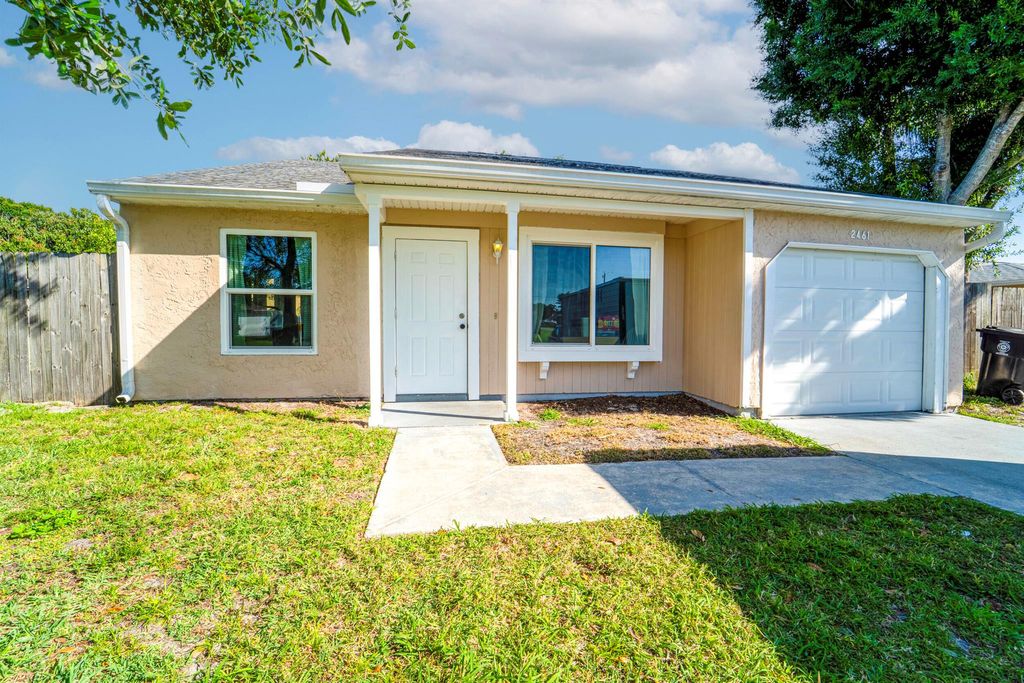 Photo of 2461 SE Alfonso Avenue, Port Saint Lucie, FL 34952 (MLS # R11081934)