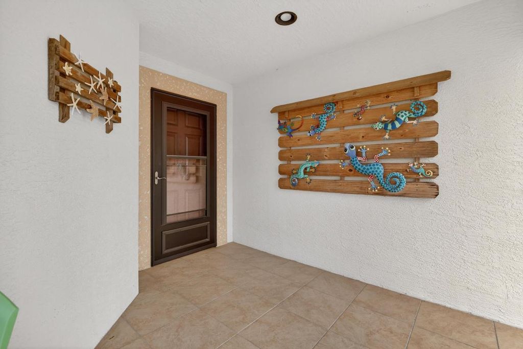 Photo of 16 Danzar, Fort Pierce, FL 34951 (MLS # R11154446)