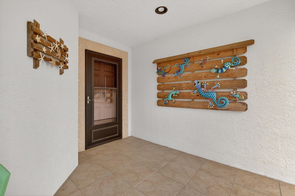 Photo of 16 Danzar, Fort Pierce, FL 34951 (MLS # R11154446)