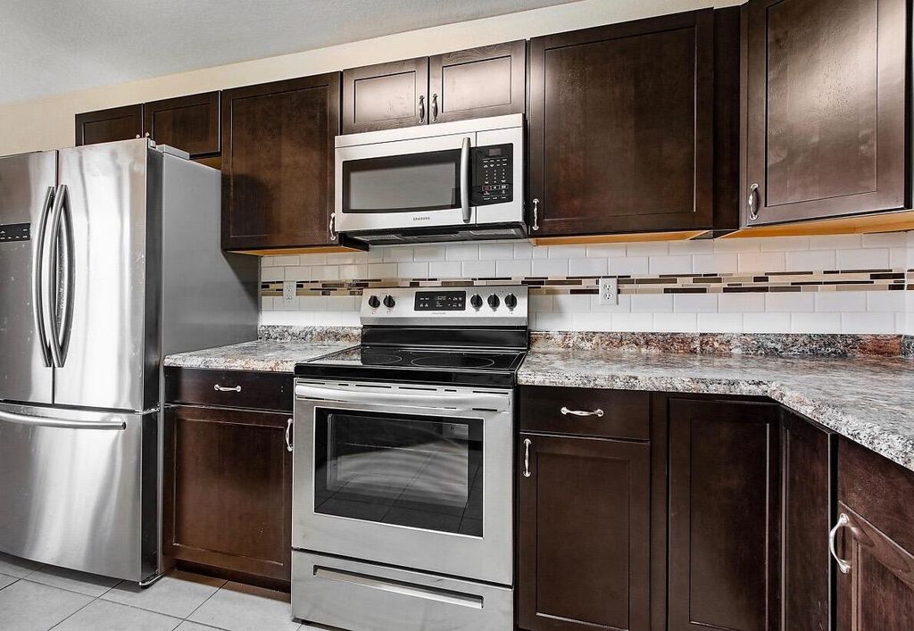 Photo of 8460 NW 40th Street #84 60, Coral Springs, FL 33065 (MLS # B26016964)