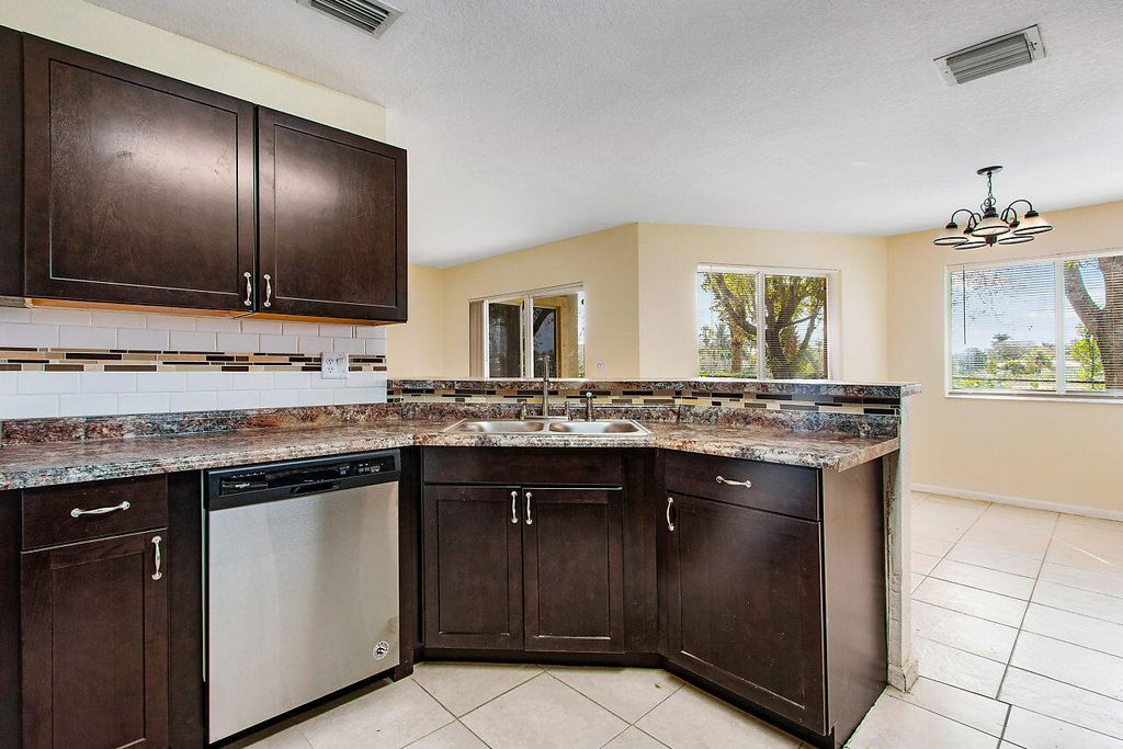Photo of 8460 NW 40th Street #84 60, Coral Springs, FL 33065 (MLS # B26016964)