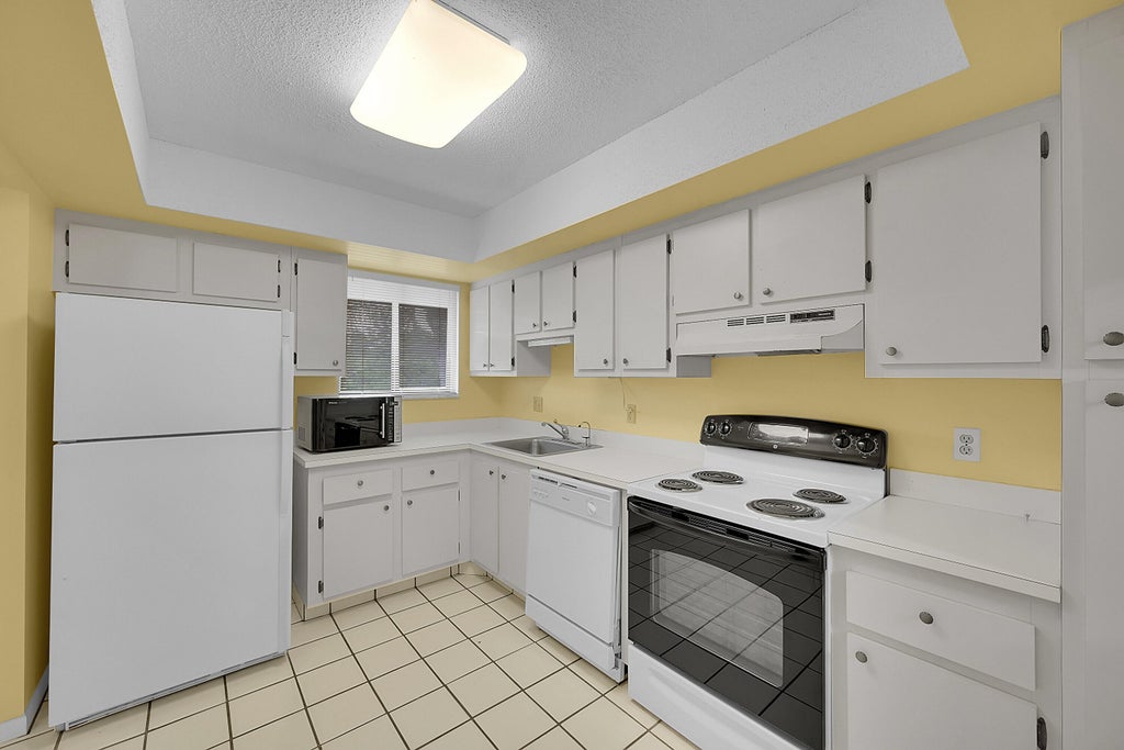 Photo of 3154 Via Poinciana #306, Lake Worth, FL 33467 (MLS # R11087763)