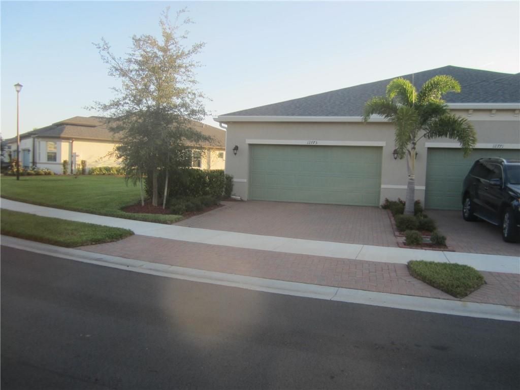 Photo of 12773 SW LAKE FERN CIR, Port Saint Lucie, FL 34987 (MLS # F10303153)