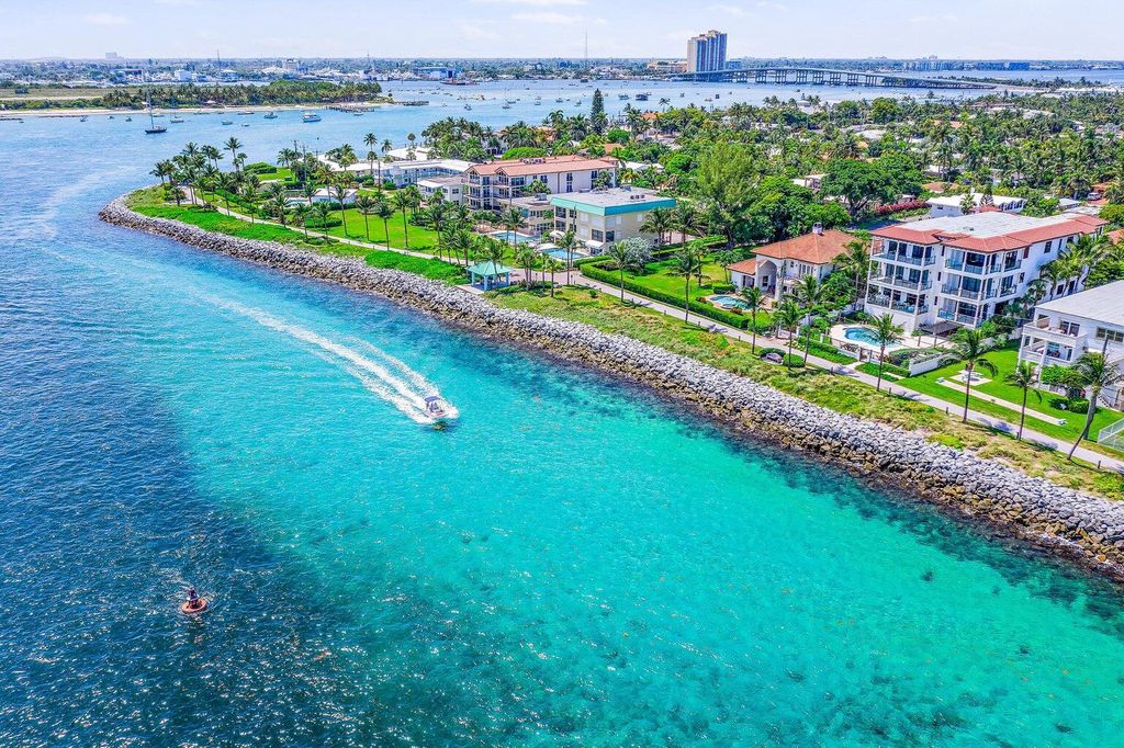 Photo of 217 Blossom Lane, Palm Beach Shores, FL 33404 (MLS # R11001942)