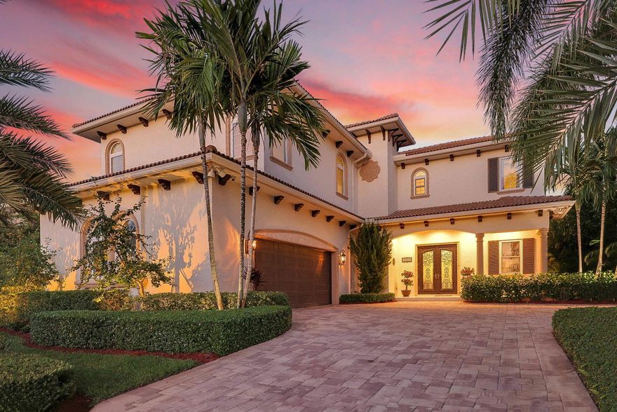 Welcome to PALAZZO DE SANTA LUCIA! An exclusive waterfront home offering the epitome of luxury coastal living. With its stunning wide water views, breathtaking sunrises, and a host of exquisite features, this residence is a true masterpiece of design and craftsmanship. The architecture of this home exudes the timeless charm and sophistication of Santa Barbara style. This elegant design is complemented by lush landscaping and meticulously maintained grounds. Step inside, and you'll find an interior that matches the exterior's grandeur. The spacious living areas are adorned with high ceilings, and custom finishes that showcase the superior craftsmanship that went into creating this home. A highlight is the gourmet kitchen, where culinary dreams come true with top-of-the-line appliances,