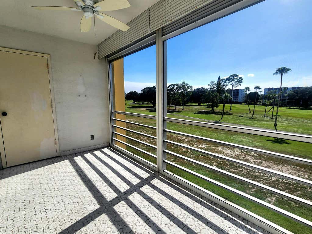 Photo of 3661 Via Poinciana #310, Lake Worth, FL 33467 (MLS # R11112633)