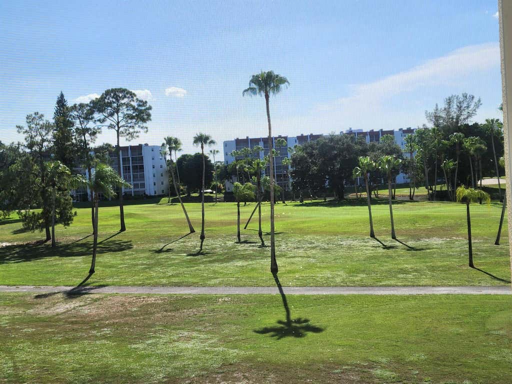 Photo of 3661 Via Poinciana #310, Lake Worth, FL 33467 (MLS # R11112633)
