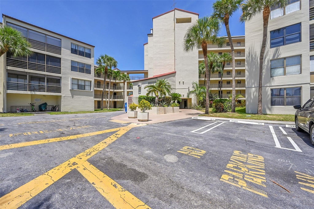 Photo of 2304 S CYPRESS BEND Drive #512, Pompano Beach, FL 33069 (MLS # B26073584)