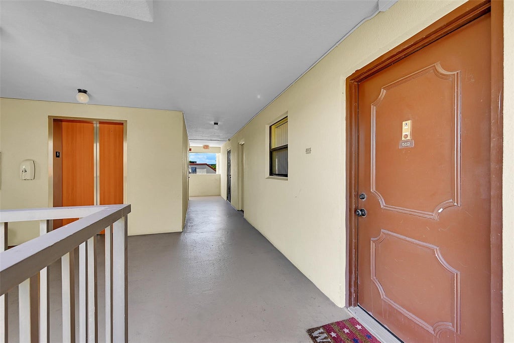 Photo of 2304 S CYPRESS BEND Drive #512, Pompano Beach, FL 33069 (MLS # B26073584)