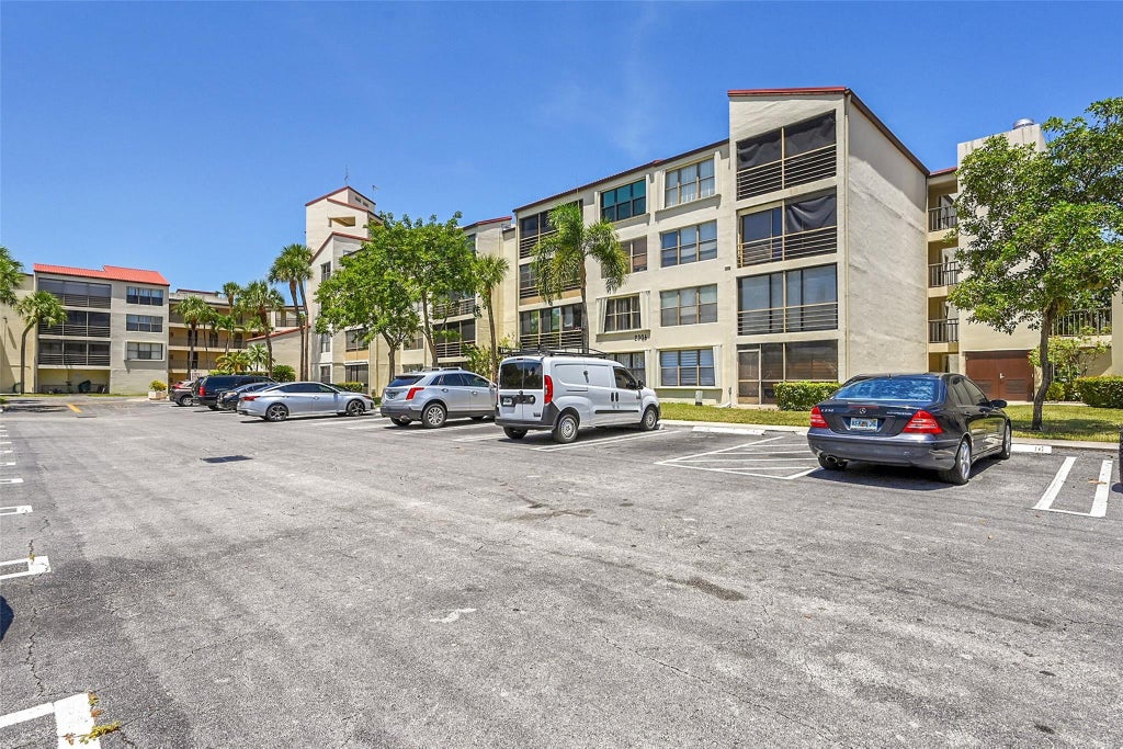 Photo of 2304 S CYPRESS BEND Drive #512, Pompano Beach, FL 33069 (MLS # B26073584)
