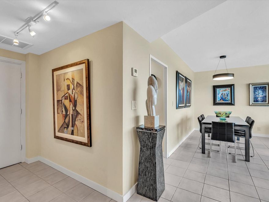 Super stylish kitchen with new quartz countertops, designer doors throughout and amazingly gorgeous bathrooms. IntraCoastal view + Ocean glimpses + Golf course view The 14th floor view looks out over canals lined with multi-million dollar homes and yachts. Doorman building with 24/7 security, large beautiful pool area, bocce ball court, fitness center, community room PLUS a clubhouse directly on the IntraCoastal. Building is in excellent physical and financial condition. Water, sewer, trash, high speed fiber optic internet and cable included in maintenance. Cash only, no renting.