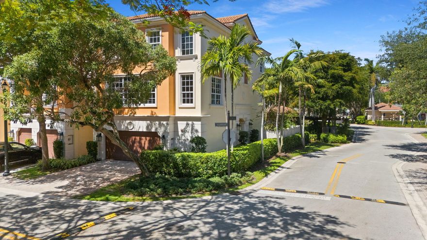 Located at 5675 NE Trieste Way, this stunning, three-story townhome has been completely renovated and is situated in the gated East Boca community of Trieste. Boasting over 3,000 square feet of living space, this desirable end unit features no neighbor on one side and is exceptionally spacious and bright, with an abundance of natural light highlighting the beautiful finishes throughout. The versatile 4-bedroom, 3.5-bathroom floor plan includes a 2-car garage and the convenience of a private elevator serving all three levels, along with full impact windows for total security.  The updated private backyard offers both a covered and open area perfect for relaxing or entertaining outdoors. Residents can enjoy the community pool located just steps away from the property.  This home boasts an amazing location, positioned just minutes from the beach and the premier dining, shopping, and entertainment hubs of both Downtown Boca Raton and Delray's Atlantic Avenue. This is a beautifully updated, move-in-ready property offering the perfect blend of style and convenience.