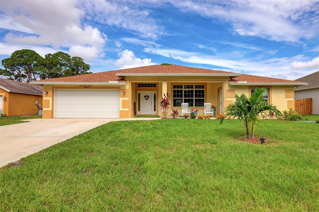 Photo of 2852 SW Collings Drive, Port Saint Lucie, FL 34953 (MLS # R10819379)