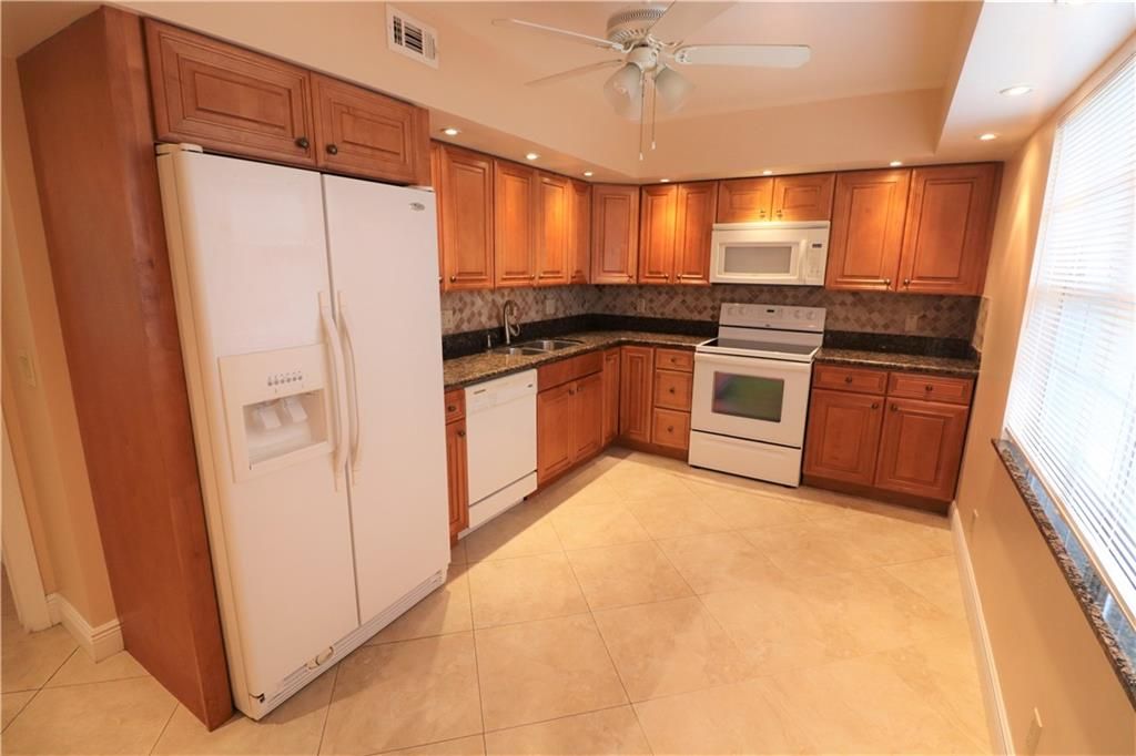 Photo of 821 Cypress Blvd #302, Pompano Beach, FL 33069 (MLS # F10287208)