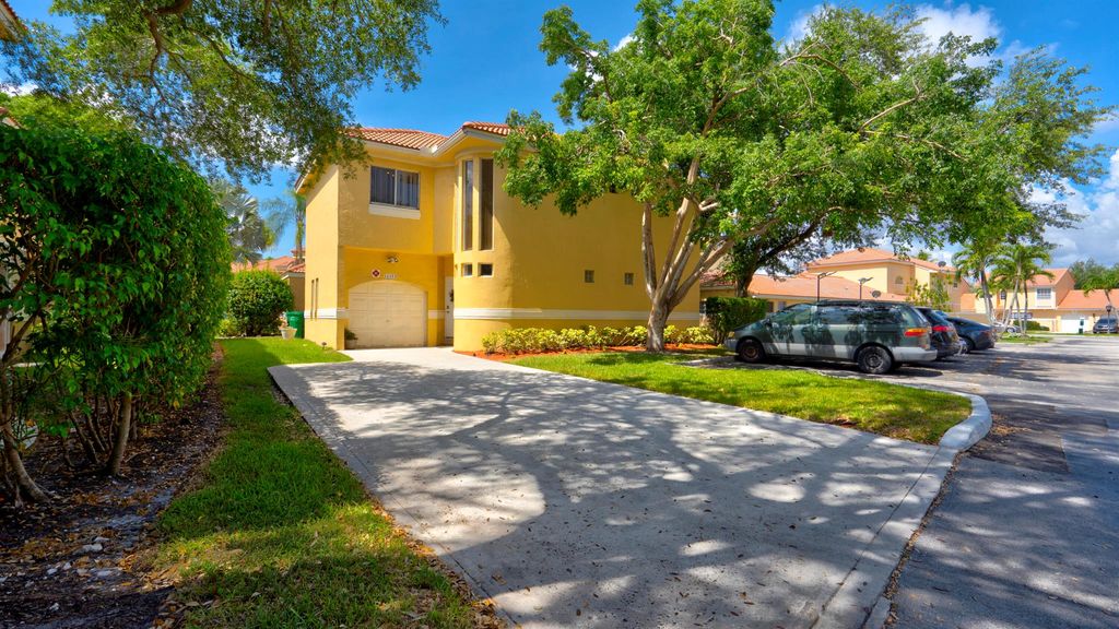 Photo of 11373 Lakeview Drive, Coral Springs, FL 33071 (MLS # R11101572)
