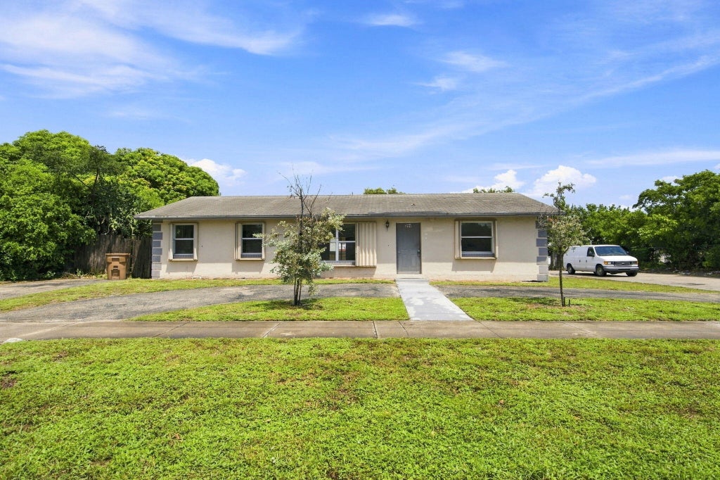Photo of 399 SW 14TH Street, Deerfield Beach, FL 33441 (MLS # B26072508)
