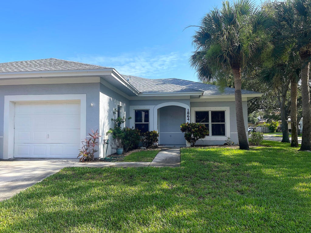 Photo of 1864 Pelican Drive, Fort Pierce, FL 34982 (MLS # B26056674)