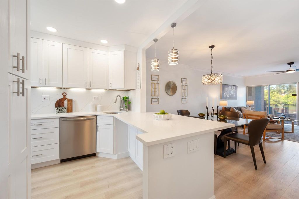 Photo of 1301 E Hillsboro Boulevard #104, Deerfield Beach, FL 33441 (MLS # R11135516)