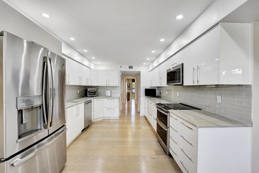 Photo of 7578 Regency Lake Drive #201, Boca Raton, FL 33433 (MLS # R11080806)