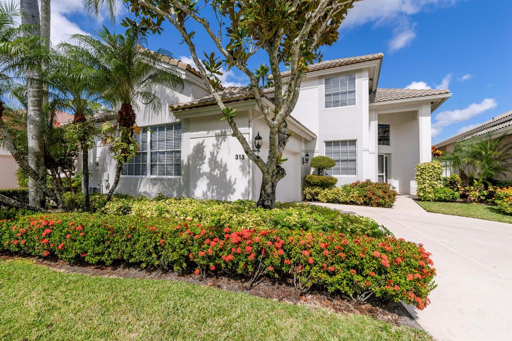 Photo of 313 Eagleton Golf Drive, Palm Beach Gardens, FL 33418 (MLS # R10932781)
