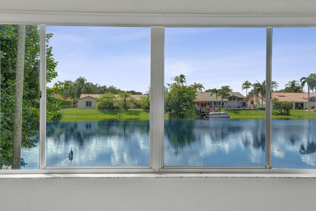 Photo of 11340 Lakeshore Drive, Cooper City, FL 33026 (MLS # B26074294)