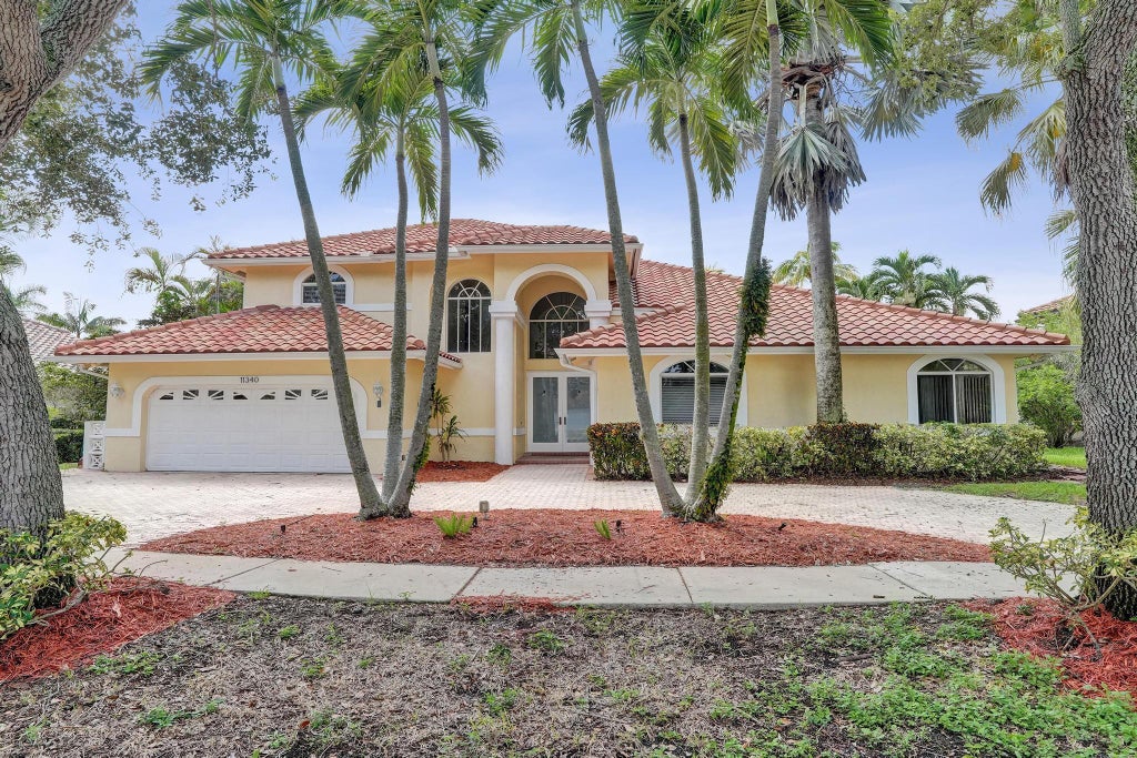 Photo of 11340 Lakeshore Drive, Cooper City, FL 33026 (MLS # B26074294)