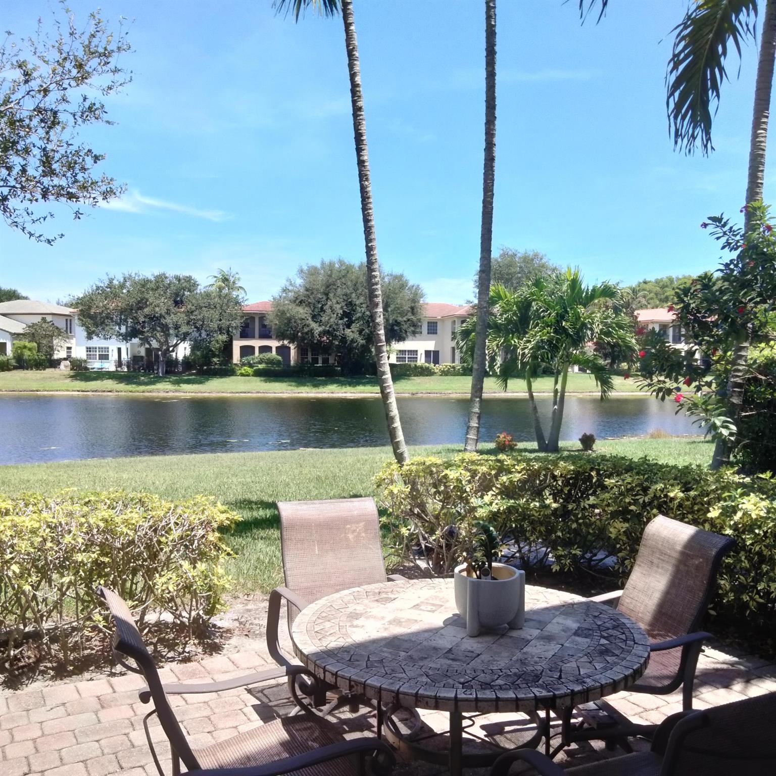 BEAUTIFUL 3BR/ 2.5BTH, 2 STORY HOUSE WITH DIRECT LAKE VIEW. OPEN KITCHEN W/BREAKFAST AREA ,SS APPLIANCES, GRANITE COUNTER TOPS. CARPET ON 2ND FLOOR. TILED LIVING ROOM WITH UPGRADED POWDER ROOM ON 1ST FLOOR. MASTER BEDROOM ON 2ND FLOOR HAS 2 SEPARATE SHELVED CLOSETS (HIS/HERS).MASTER BATHROOM INCLUDES SEAMLESS SHOWER ,SOAKING TUB, DUAL SINKS. 2ND & 3RD BEDROOMS HAVE CLOSET SPACE. LAUNDRY ROOM W/FULL SIZE WASHER & DRYER ON 2ND FLOOR. GARAGE IS CONVERTED INTO PLAY ROOM UNDER A.C. SHORT WALKING DISTANCE TO CLUBHOUSE & POOL. BASIC CABLE, TRASH PICK-UP ARE INCLUDED IN RENT. GATED COMMUNITY 'EVERGRENE' OFFERS MANNED GUARD GATE & CLUBHOUSE WITH FULL GYM, RESORT STYLE POOL, HOT TUBS, WATER PARK & TIKI HUT.CLOSE TO I-95,PB GARDENS MALL,PB AIRPORT,BEACHES