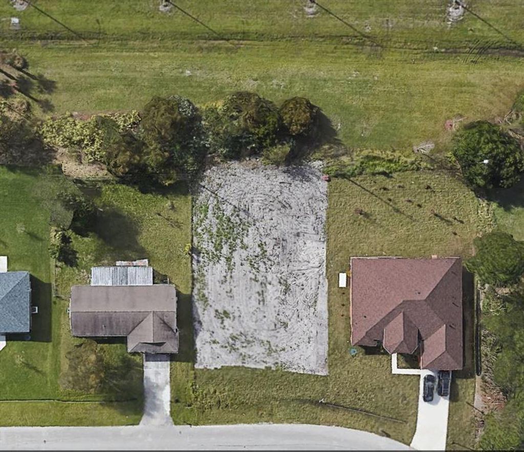 Photo of 1574 SW Calmar Avenue SW, Port St Lucie, FL 34953 (MLS # R10871406)