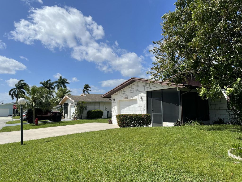 Photo of 13817 Kaiser Trail, Delray Beach, FL 33484 (MLS # B26022151)