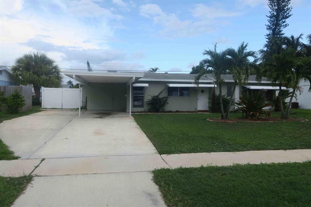 Photo of 804 Cinnamon Road, North Palm Beach, FL 33408 (MLS # R10746403)