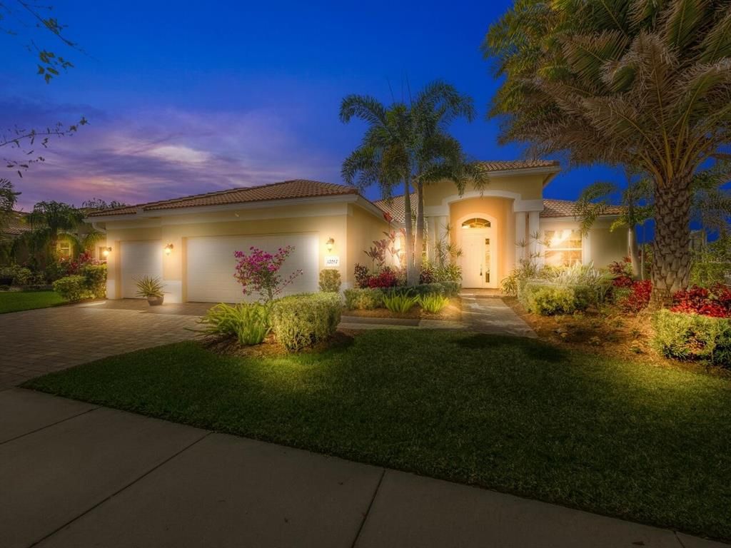 Photo of 12057 SW Aventino Drive, Port Saint Lucie, FL 34987 (MLS # R10783279)