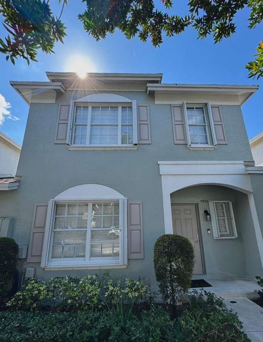 Bright, stylish, and well-maintained 2-bedroom, 2.5-bath townhouse with a 1-car garage and an open living layout designed for everyday comfort. Updated kitchen and bathrooms create a fresh, modern feel throughout. Enjoy a private, fenced patio perfect for morning coffee, relaxing evenings, or entertaining guests. Impact-rated garage door and accordion hurricane shutters provide peace of mind. The AC system features RGF REME-H air purification with UV light for enhanced indoor air quality.Located in a well-kept, pet-friendly community with low HOA fees that include roof maintenance and lawn care, offering low-maintenance living. Residents enjoy access to a pool, tennis and pickleball courts, and a playground, all ideally situated near everyday conveniences. Move-in ready and easy to love.