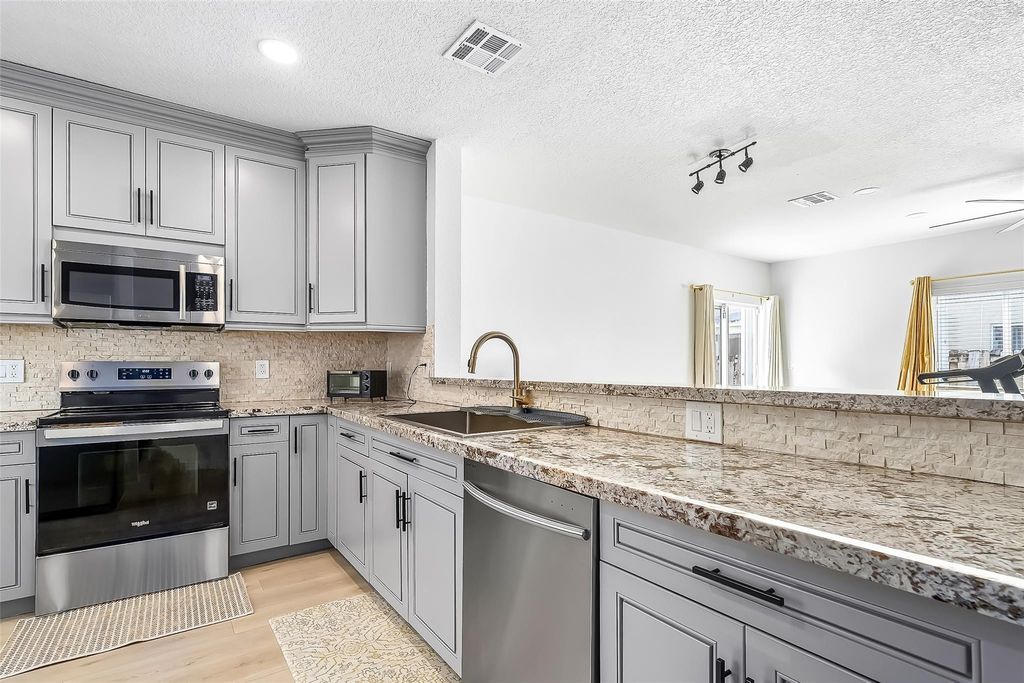 Photo of 9500 Stanley Lane, Tamarac, FL 33321 (MLS # F10546539)