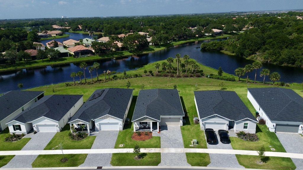 Photo of 9049 Dahlia Circle, Port Saint Lucie, FL 34986 (MLS # B26043615)