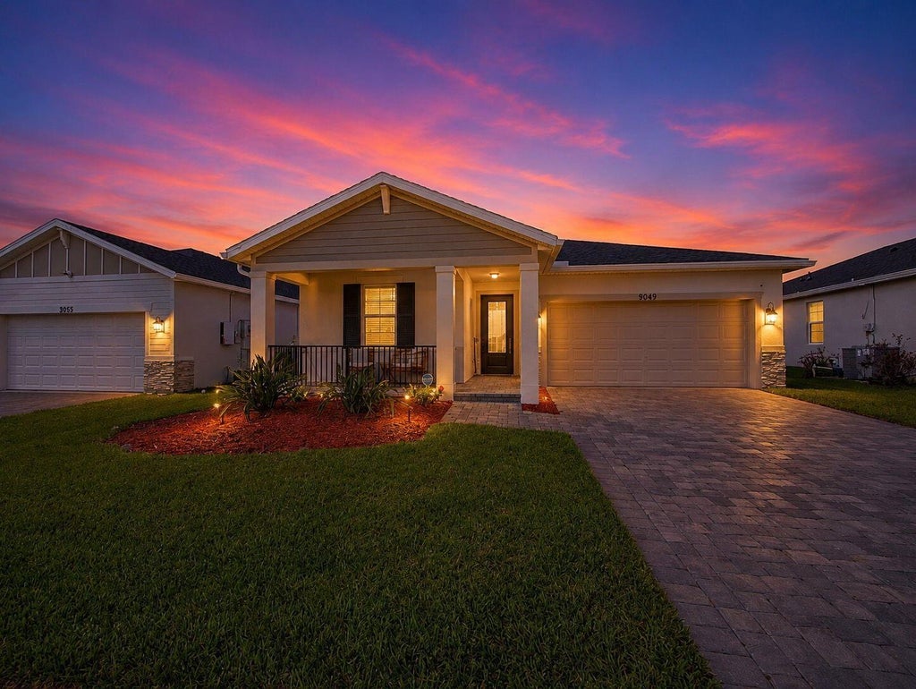 Photo of 9049 Dahlia Circle, Port Saint Lucie, FL 34986 (MLS # B26043615)