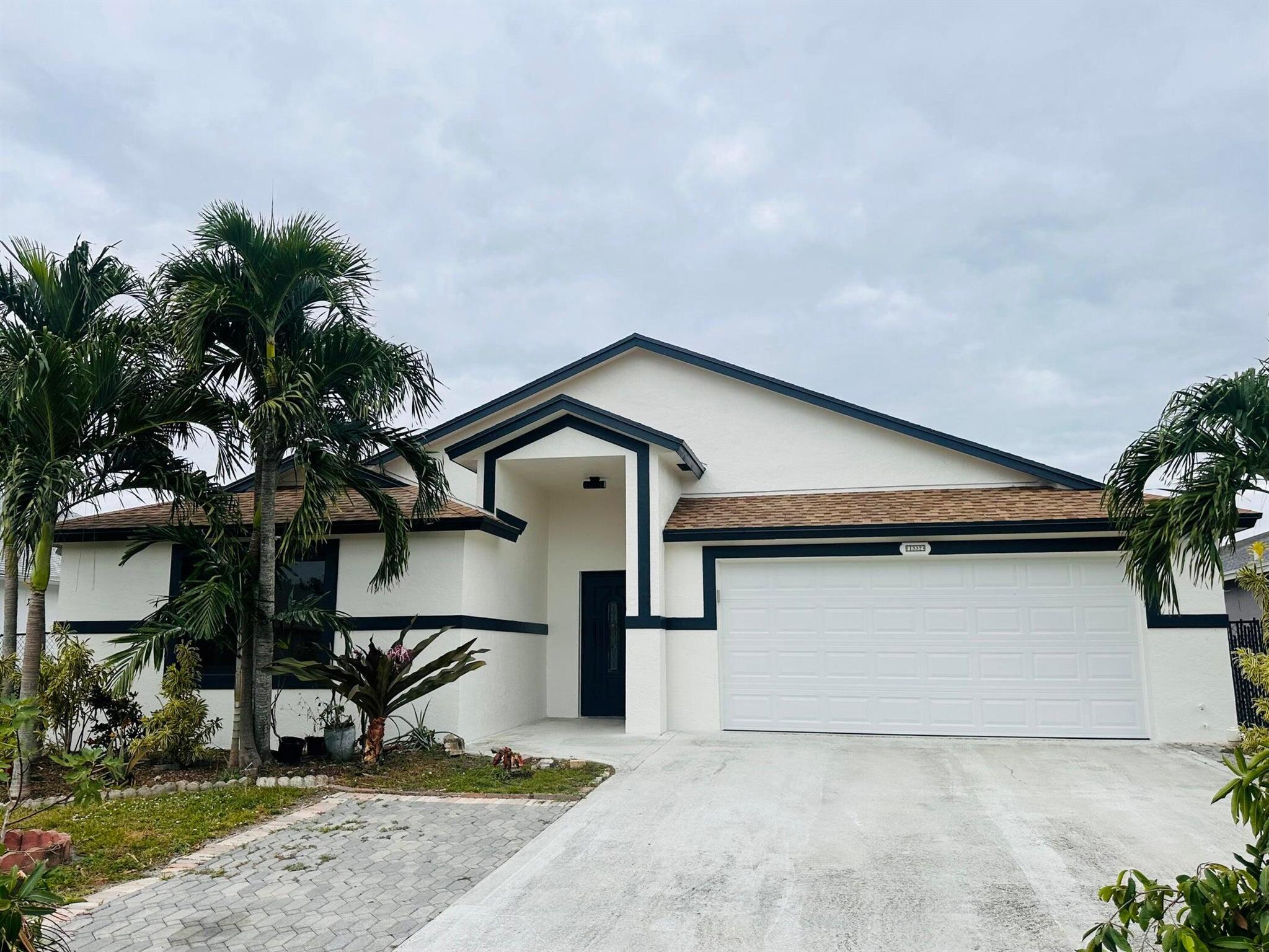 This newly renovated property is a beautiful oasis with fruit trees, Open patio, stainless steel appliances, Electric vehicle hook up in garage, natural gas cooking, all impact doors and windows. A must see ready to move in Nov 1.