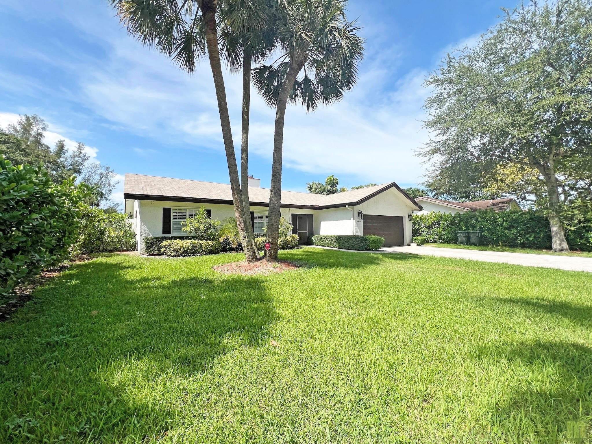 AVAILABLE NOW - beautiful, updated 3/2 + 2-car garage + pool. Amazing lake view, open & spacious living area with vaulted ceilings, fireplace, tile throughout, gorgeous kitchen with granite countertops & stainless steel appliances, open dining area with views of the pool and lake. Large lot with 75 feet of deeded lake access, backyard is completely fenced iwith PVC along the sides and a chain link fence along the rear. Lakewood East is one of Coconut Creek's best kept secrets. Quiet, well-kept, friendly neighborhood with 2 parks right in the subdivision. Close to Turnpike, Coconut Creek Community Center & Promenade. Tenant is responsible for water, electric, lawn care, cable / internet & renter's ins. No pets, no smoking. Rapid approval / NO HOA. Landlord provides pool service.