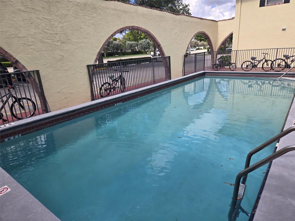 Photo of 10701 Royal Palm Boulevard #14, Coral Springs, FL 33065 (MLS # F10518559)