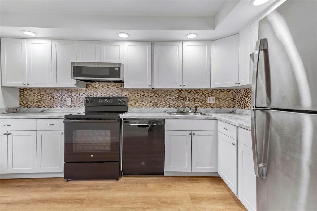 Photo of 3001 NW 46th Avenue #310, Lauderdale Lakes, FL 33313 (MLS # F10508529)