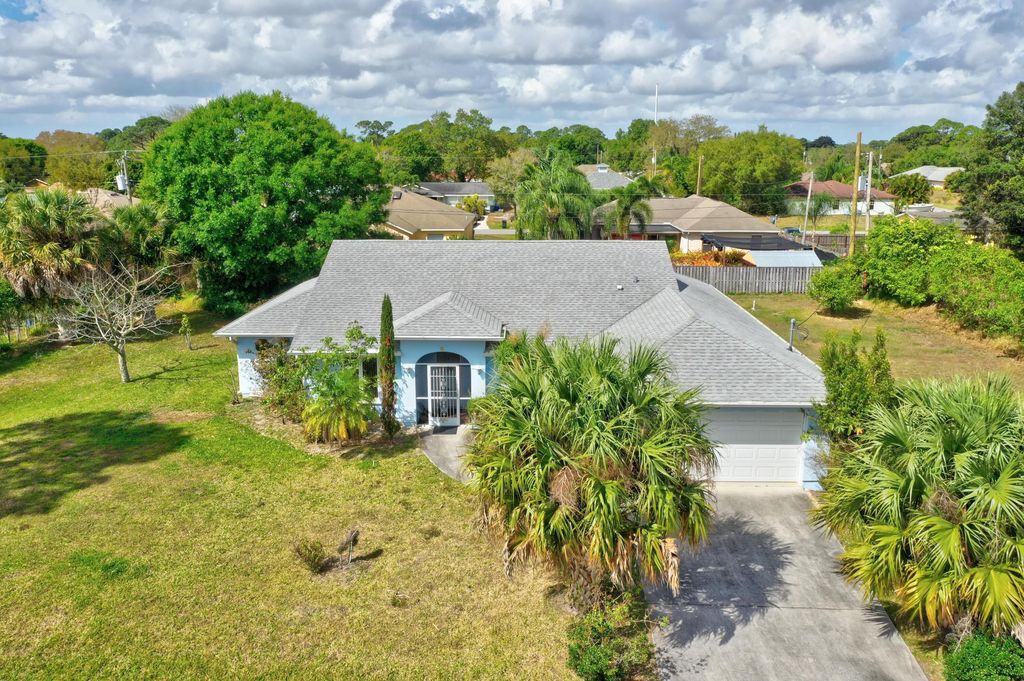 Photo of 1722 SW Cochran Street, Port Saint Lucie, FL 34953 (MLS # R10782696)