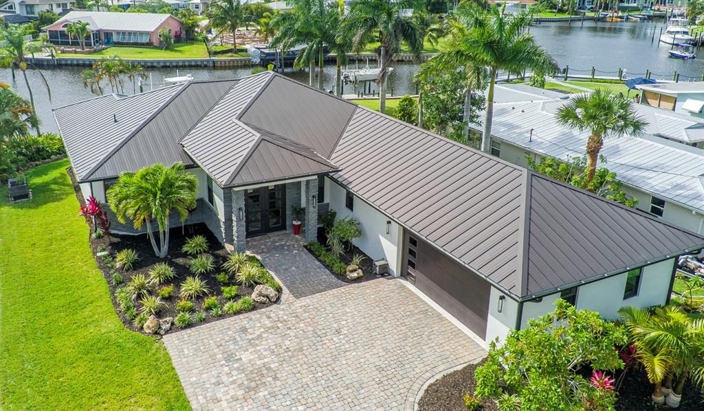 Photo of 1595 SW Egret Way, Palm City, FL 34990 (MLS # R10883562)