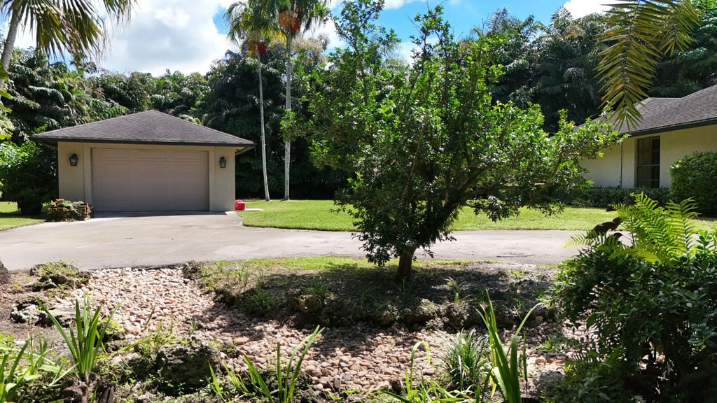 Photo of 12320 NW 2ND Street, Plantation, FL 33325 (MLS # B26080681)